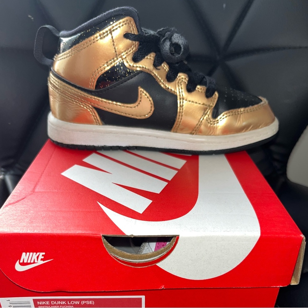 Black and gold Jordan